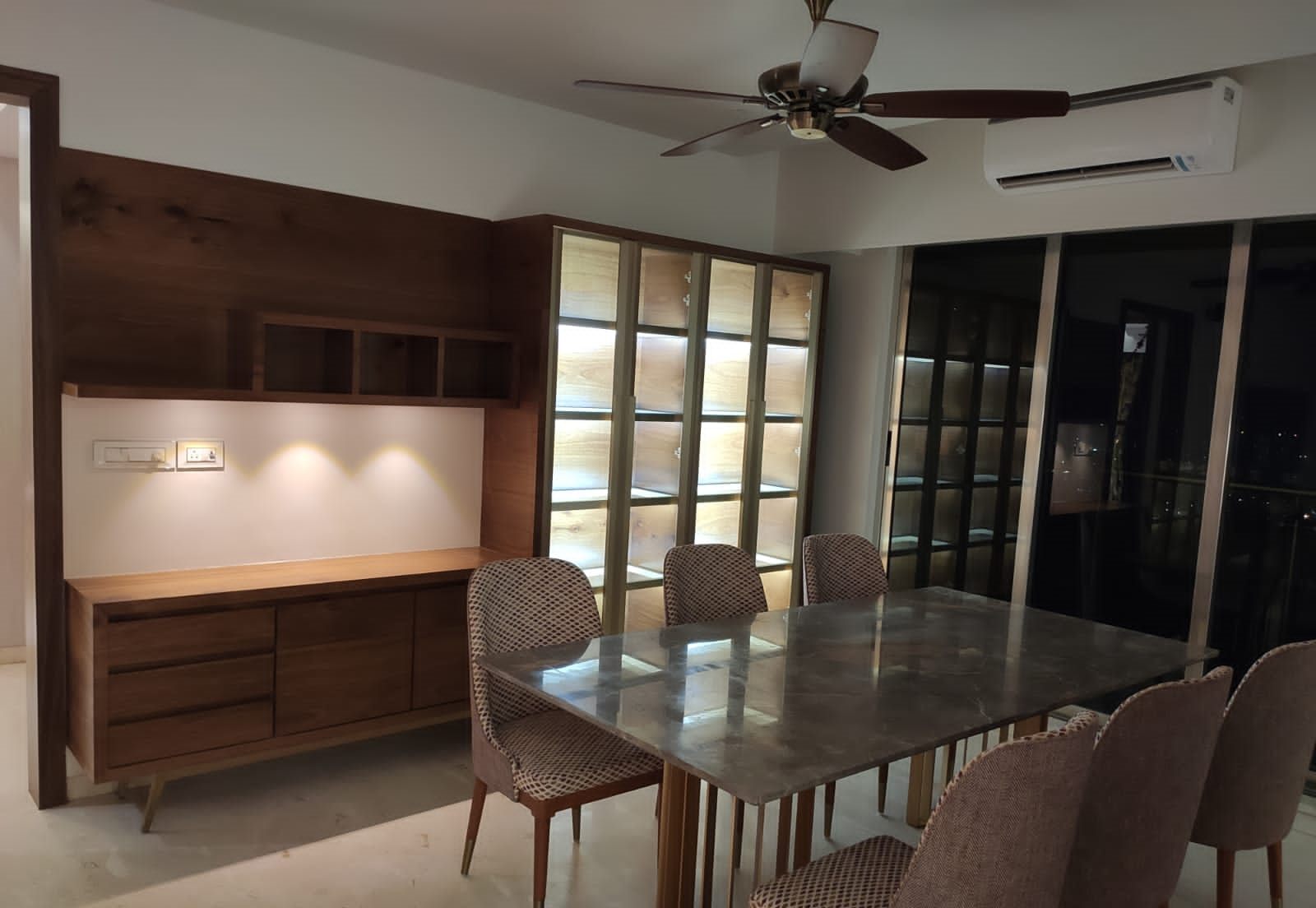 Dining area with walnut crockery and display unit