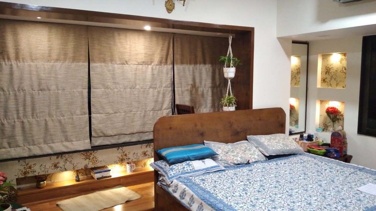 Bed with headboard storage beneath the window