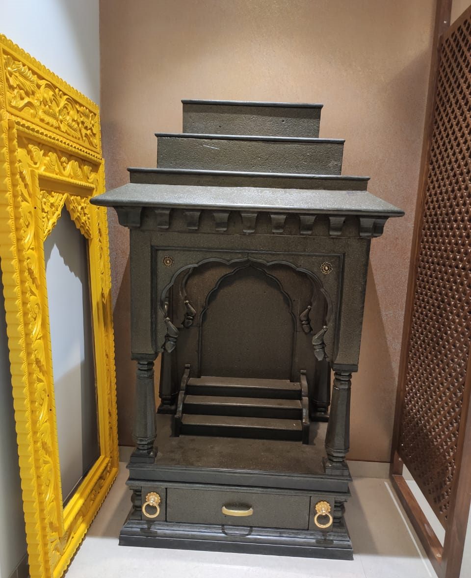 Carved wooden mandir